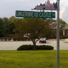One other neat detail was this street sign. All of the other streets in the neighborhood had fairytale names (Wishing Well Rd., King Cole Rd., etc.), as well as their own Gingerbread Castle floating above it.